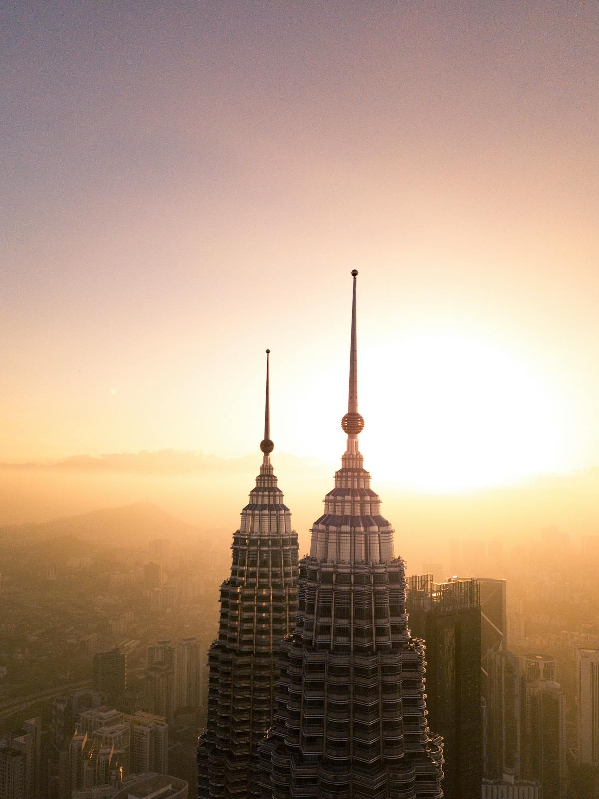 Golden hour light painting the towers